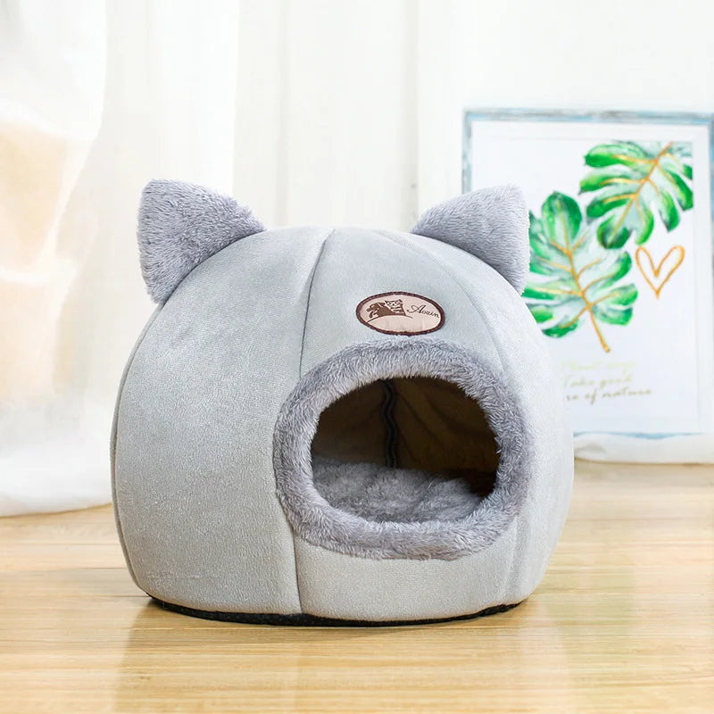 Cozy winter cat bed, soft mat, pet tent, and indoor cave nest.